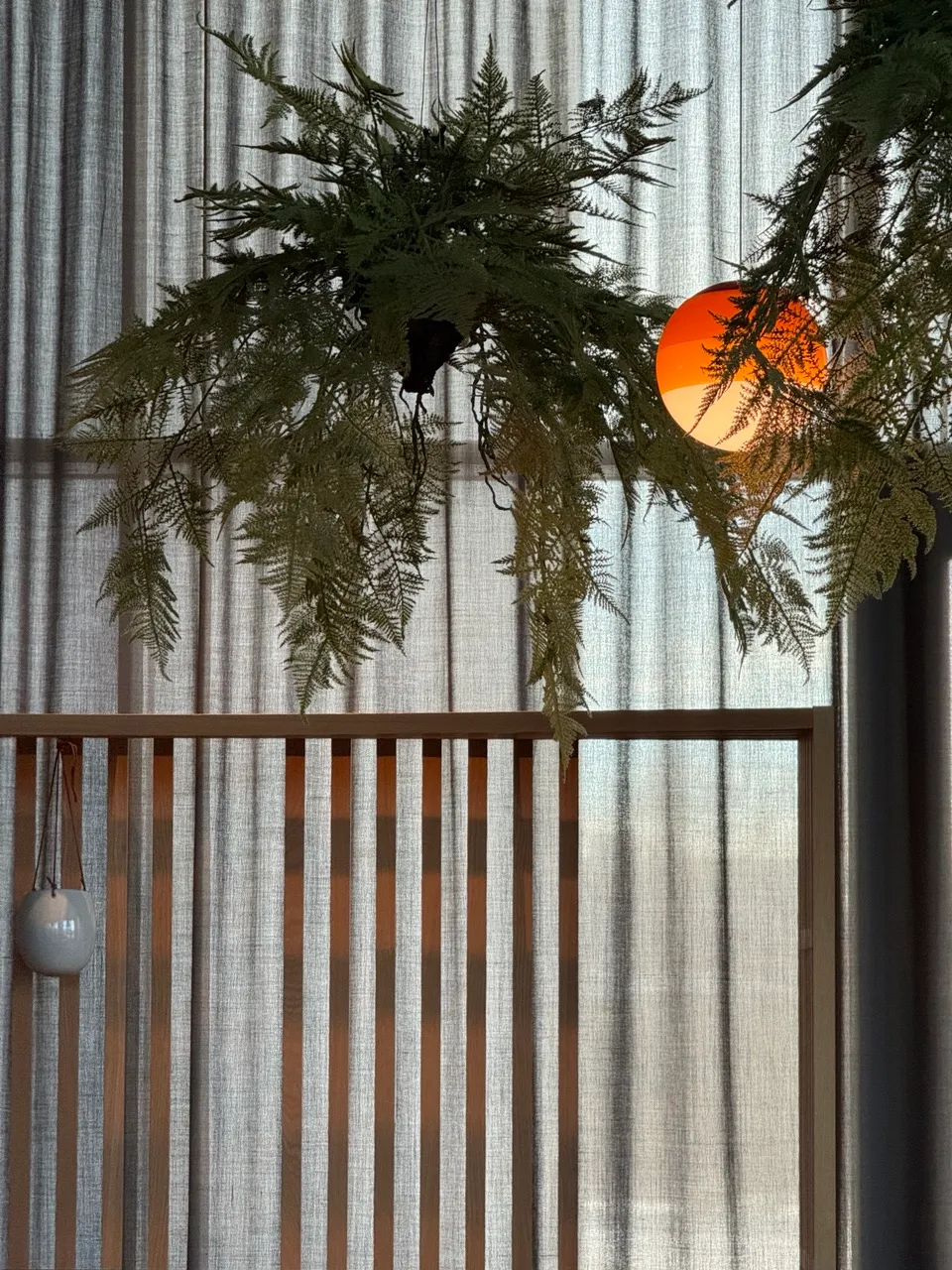 Finished custom glass pendant shade in the airport hotel interior lighting installation
