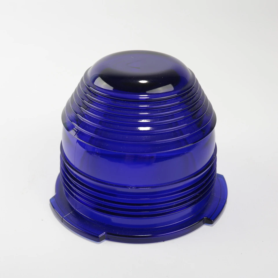 Deep blue domed glass cover with broad horizontal rings and a projecting circular flange