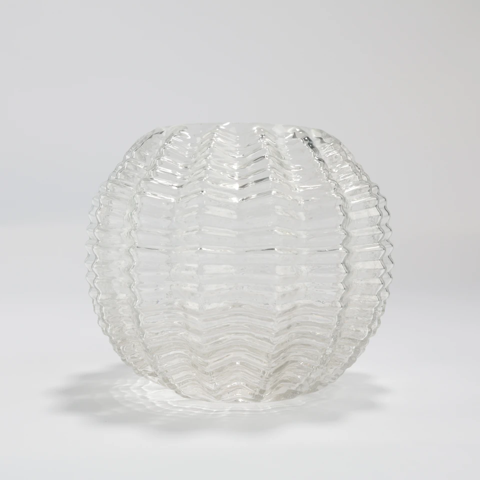 Clear open globe shade with repeating chevron surface relief