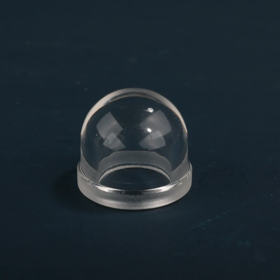 Small clear glass dome standing on a broad circular base rim