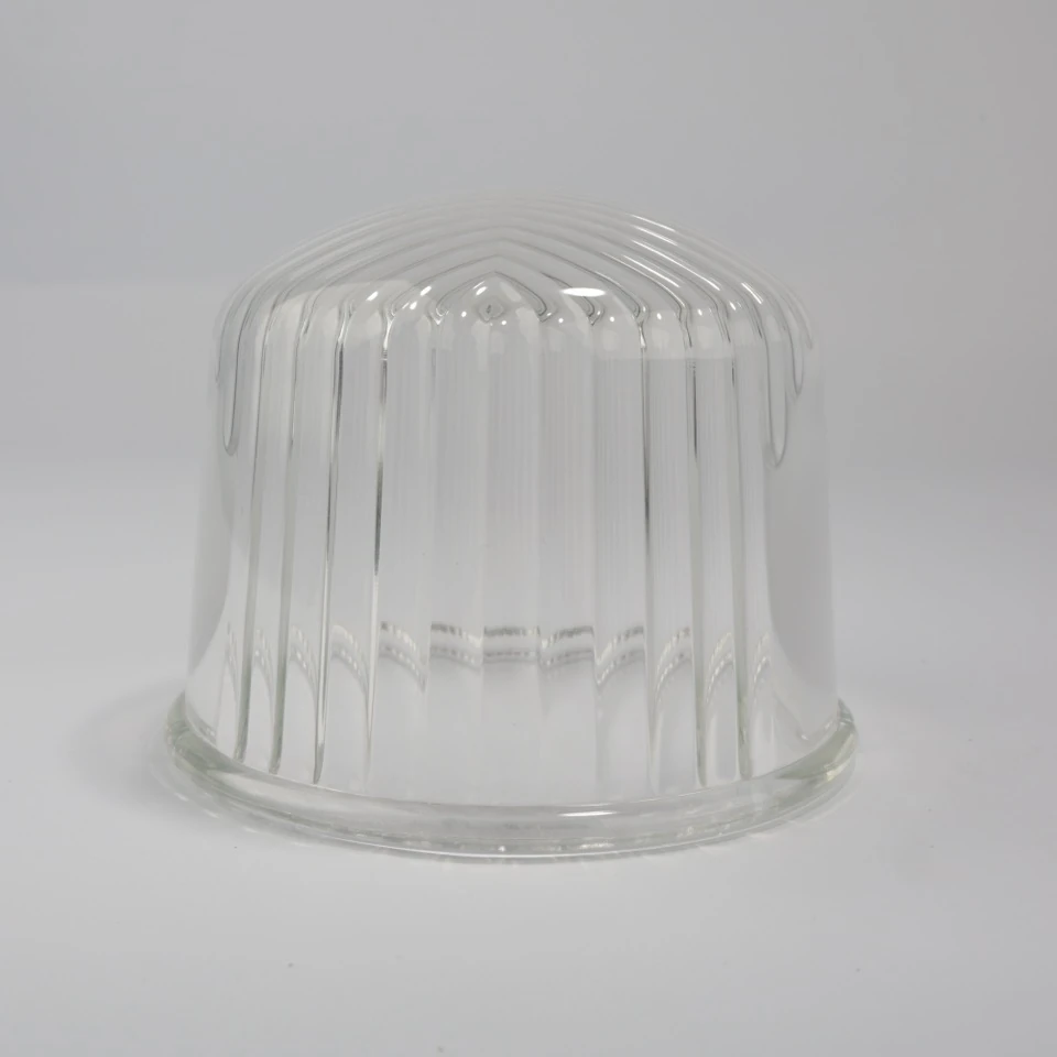 Clear ribbed glass dome standing on a broad circular rim