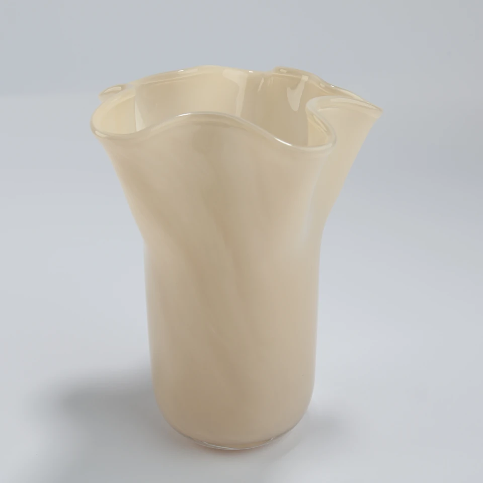 Angled top view showing the open ruffled glass rim