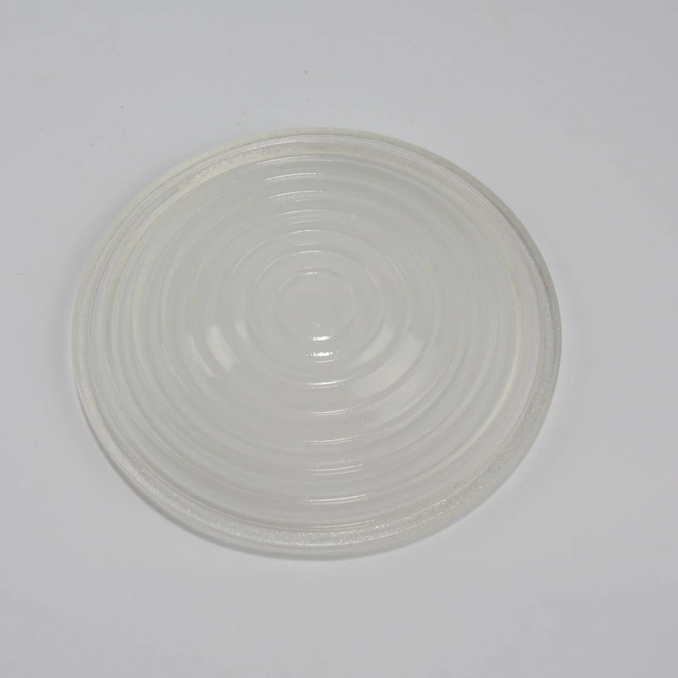 Low side view showing the Fresnel lens profile and perimeter rim
