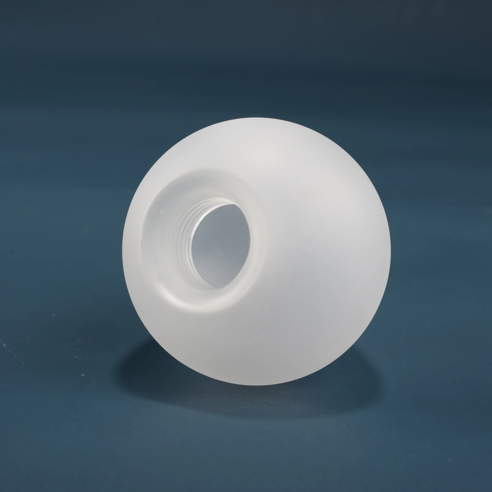 Angled globe shade showing the circular attachment opening