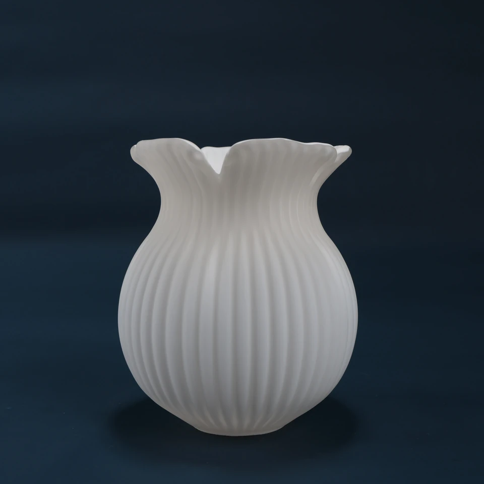 Matte white ribbed floral glass shade with a flared petal rim